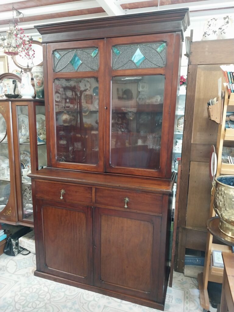 Late Victorian Mahogany Two Door Book Case, with leaded stain glass panels. Measures 45" wide by 20" deep 80" high. Lovely Condition, with nice patina. €375