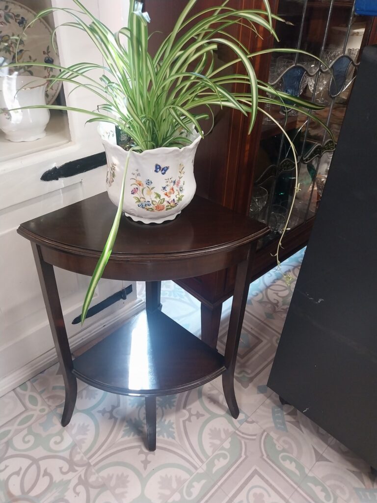 Neat Size Mid-century Mahogany Corner Plant Stand. 20" high by 11" deep, 16" wide.
€58 Two available.