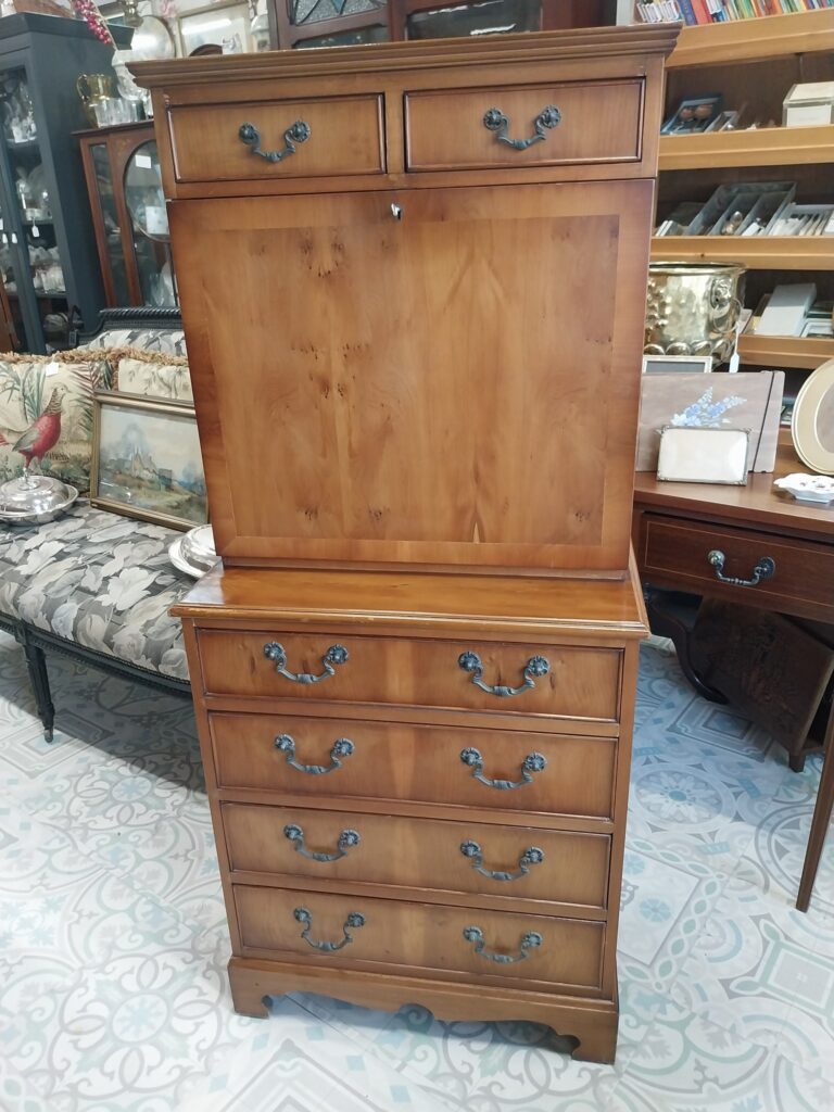 Vintage Yew Wood Georgian Style Secretary Desk. Neat Size with fitted Interior. In Very Good Condition. Measures 53" high
23" wide by 15" deep. Drop Down Work Space
17.5" by 22"
