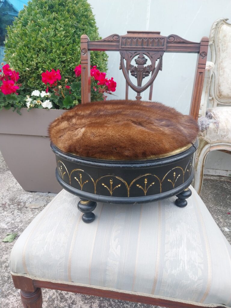Victorian Ebonised with Gilt Detail Foot Stool. Covered in Mink Fur. good condition.
18" wide by 10" high €78