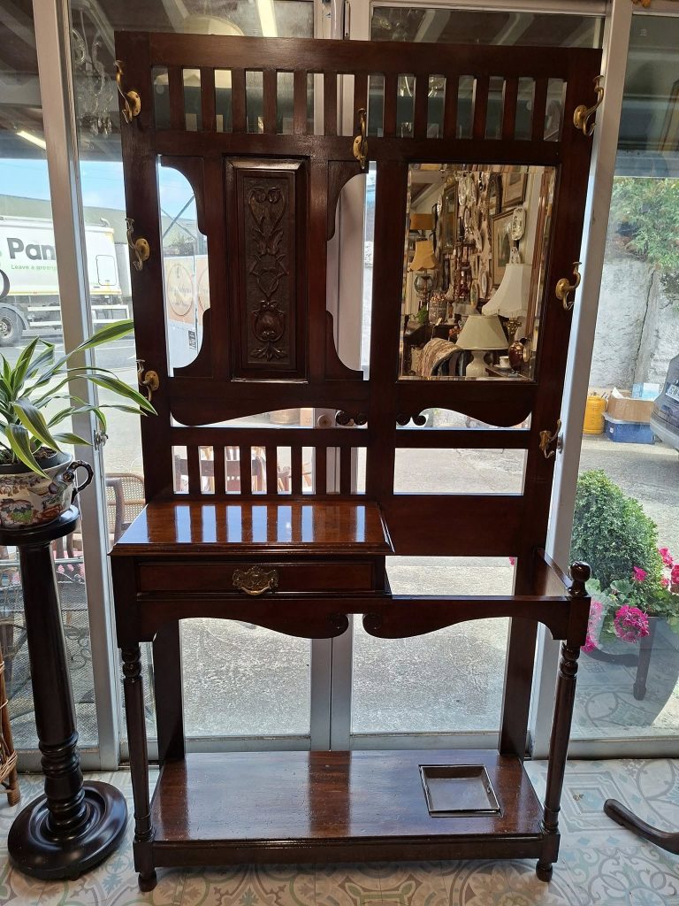 Art Noveau Mahogany Hall Stand circa 1880s.
Very Good Condition. Measures 76" high by 42" wide 13" deep