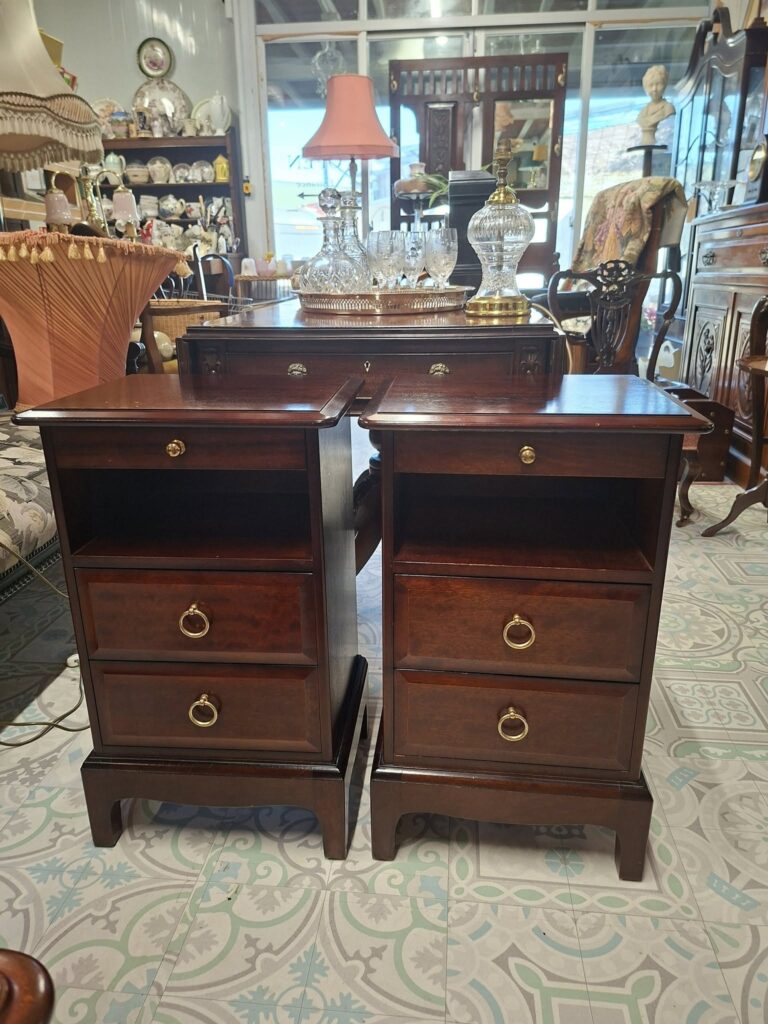 Pair of Vintage Mahogany "Stag" Pull and Slide Bedside Cabinets/Lamp Tables. Very good condition. Measure 12" deep by 16" wide 25 high"