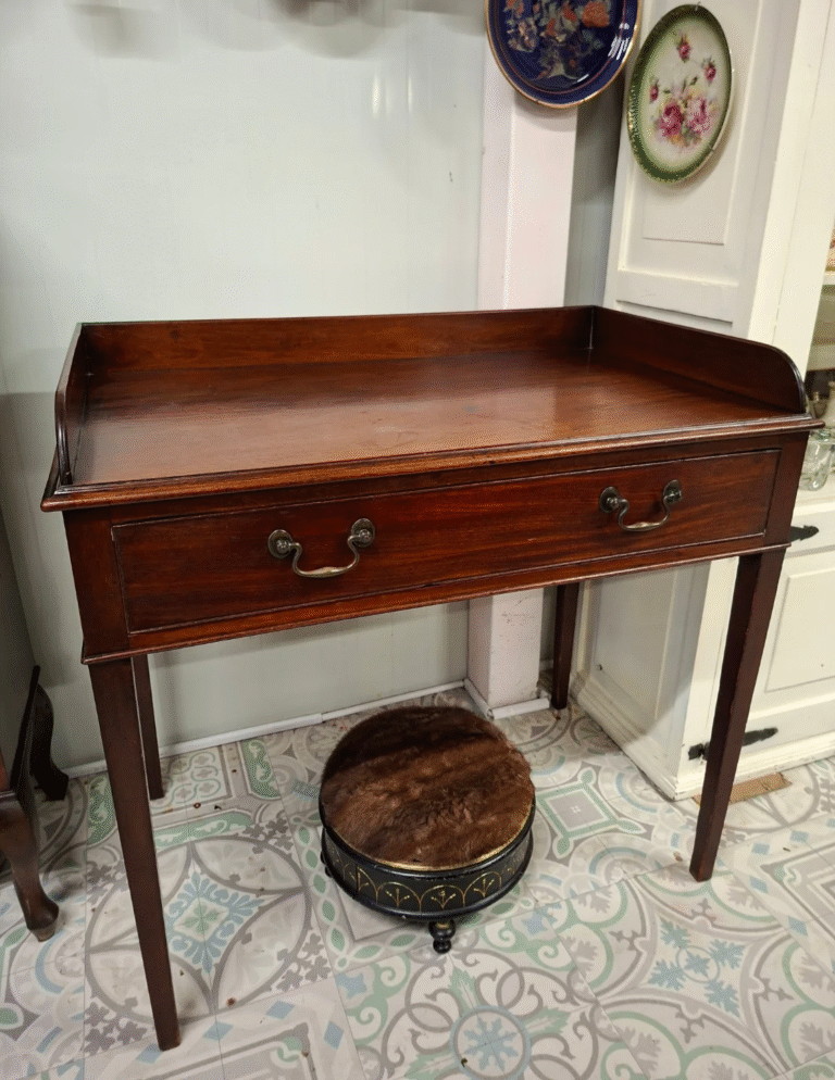 Georgian Mahogany Side Table with Gallery Back. Fitted with single drawer. Very clean condition. Measures 36" wide by 26" deep 34" high €295