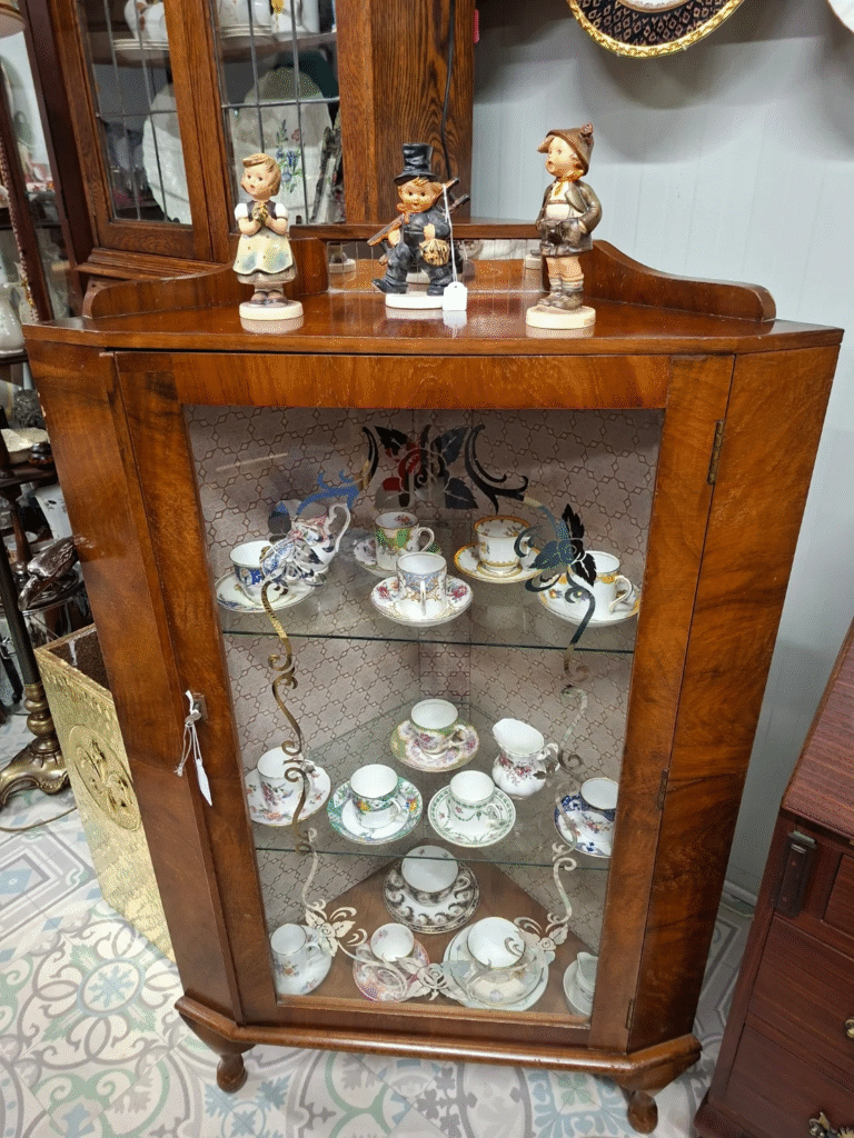 1960s Corner Display Cabinet from S.F. Quinn Cabinet Makers, Ireland. Very good condition. Measures 28" wide by 42" high