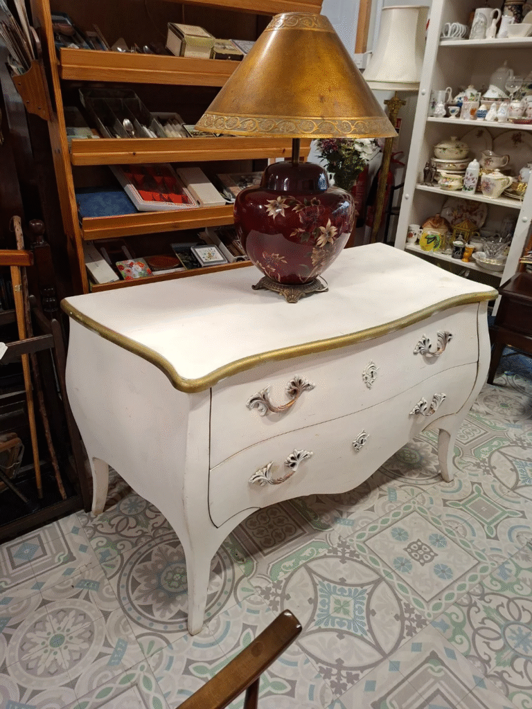 Vintage French Bombe Chest. Measures 42"
wide by 22" deep 30" high. In very good condition.