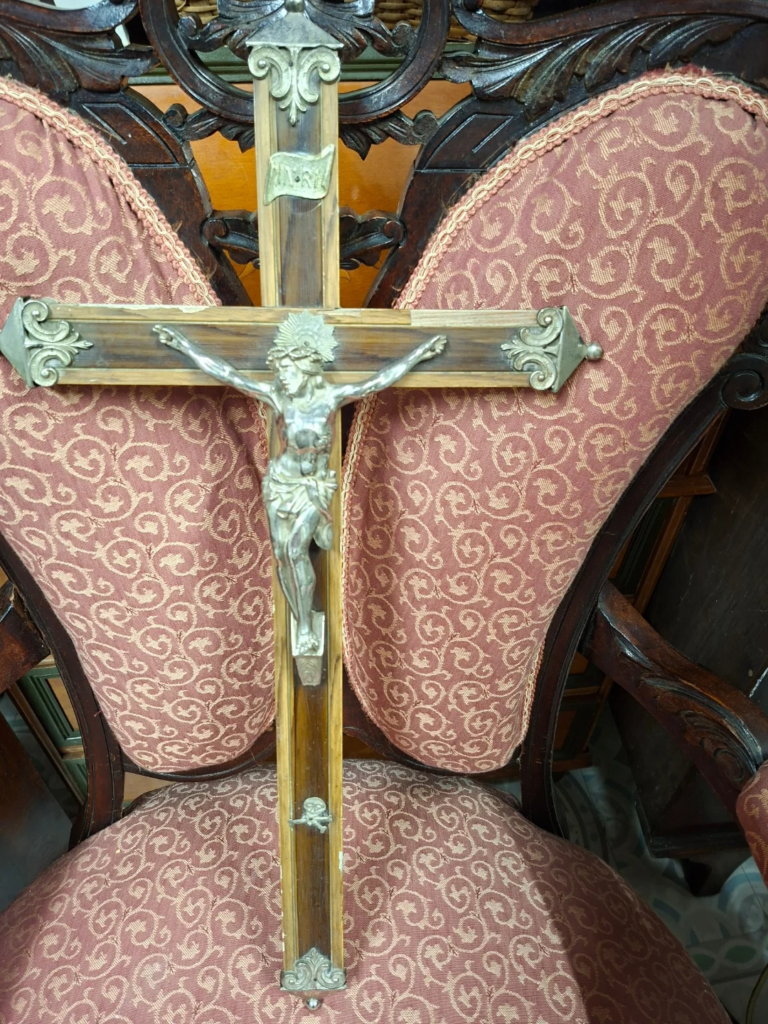 Antique Portuguese Crucifix. Native wood and silver-plate figure. Small bit of veneer loss left hand arm. Measures 20" high by 11" wide. Good condition.