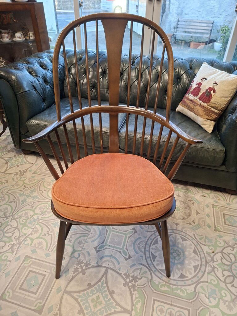 Vintage Ercol Windsor Chair. Measures 25" wide, 18" deep by 42" high.