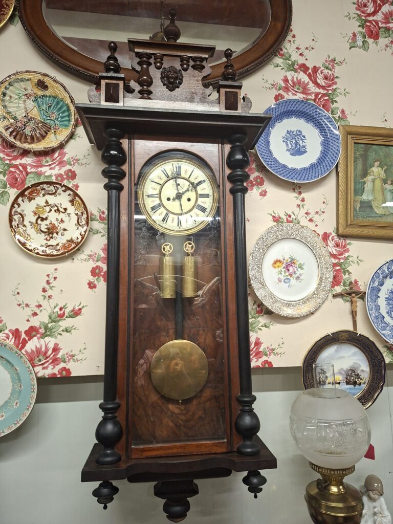 Antique Victorian Twin Weight Vienna Regulator. Walnut and Ebonised Case. Circa 1880.
8 day movement, striking on hour and half hour. Measures 46" high by 19" wide.
