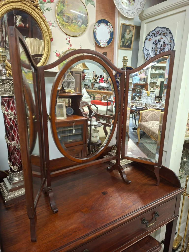 Antique Mahogany Triple Wing Dressing Mirror. Circa 1910. Centre mirror measures 23" by 15". Each wing measures 27" by 9" Height 28" Beautiful clean condition.