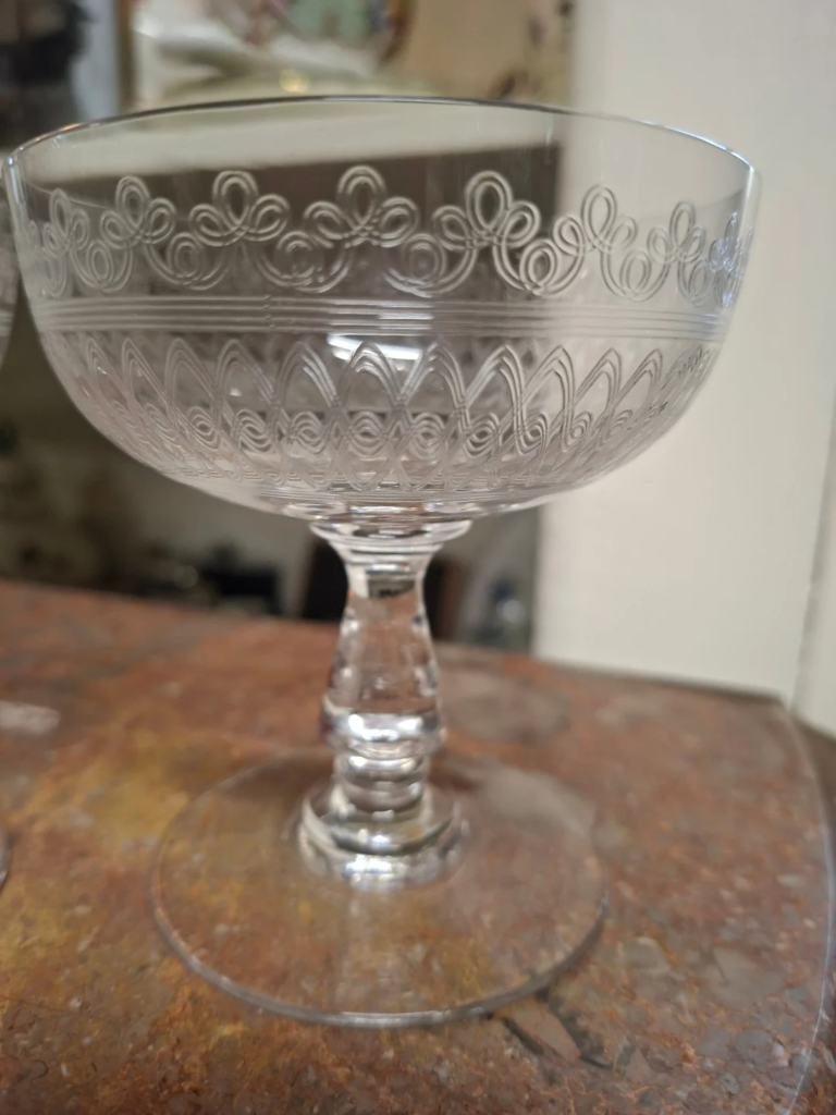 Pair of Edwardian Pall Mall Champagne
Coupe. Measure 4.5" high by 3.75" wide. Excellent condition.