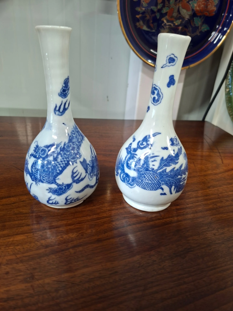 Pair of Antique c.1920s Japanese Blue and White Bottle Vase.
Produced for export market. Signed. In very good condition.  Measures 6.75"