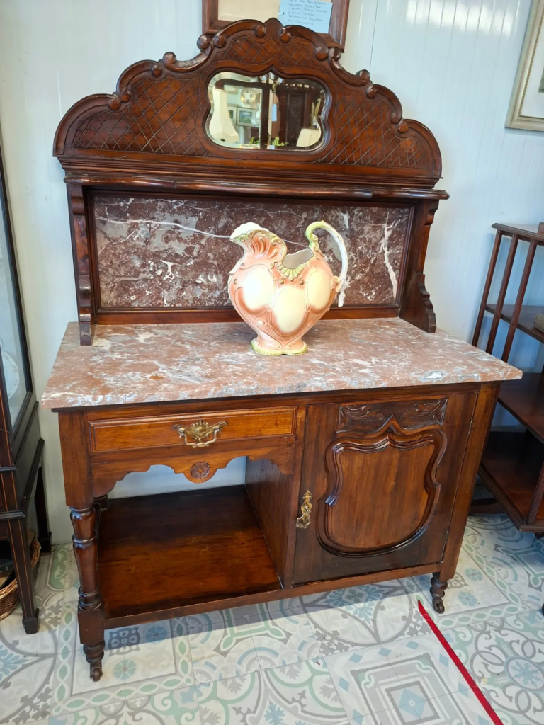 Antique Late Victorian Mahogany Washstand with Marble Top. Excellent condition. Measures 42" wide by 20" deep by 60" high €375