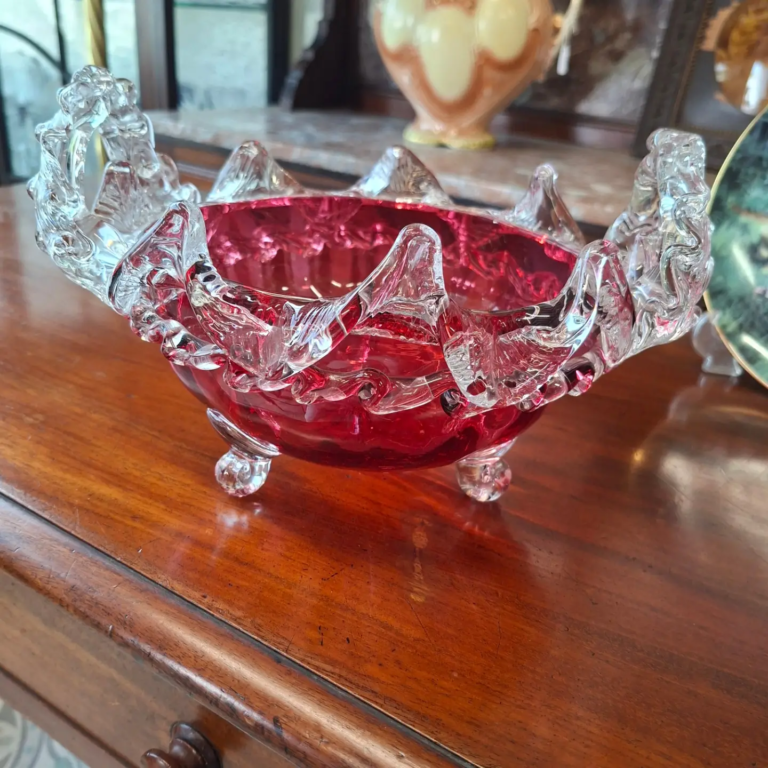 Victorian Cranberry Glass Bowl with Applied Clear Glass Trim. 10" wide by 7" high. Excellent condition.
