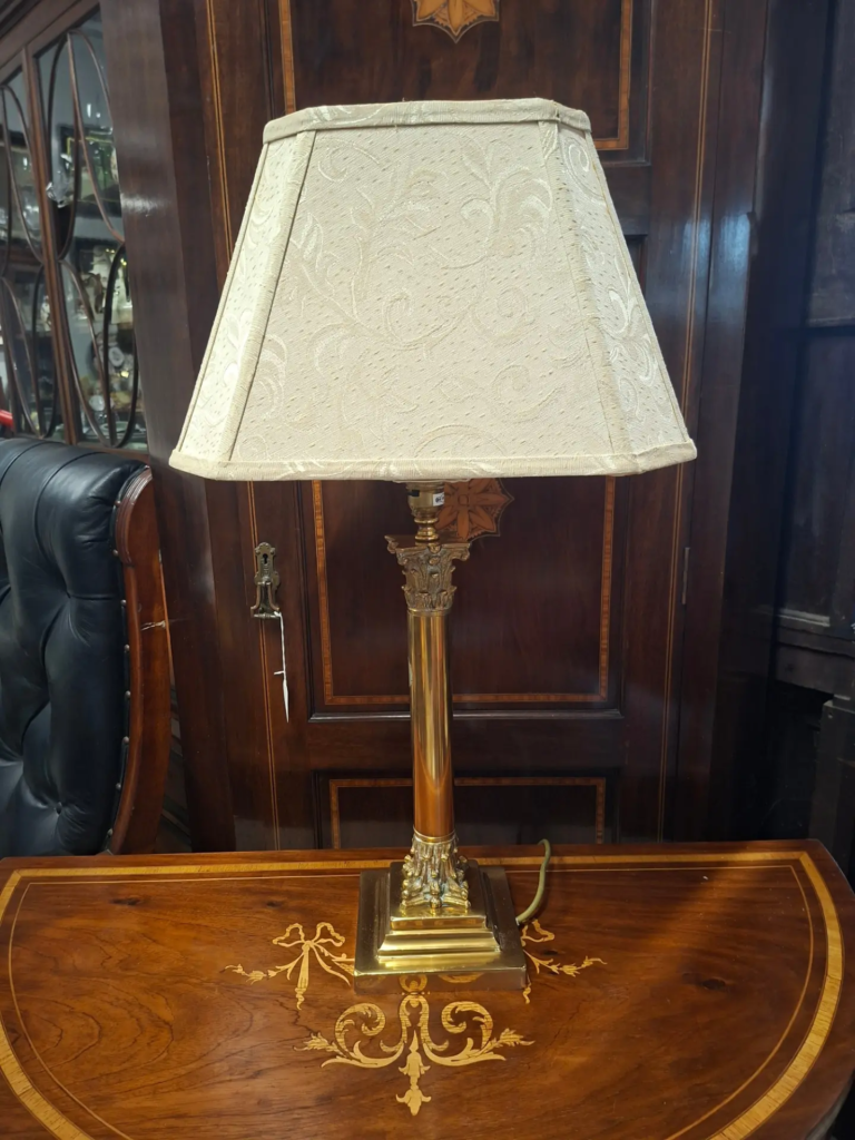 Italian Brass Corinthian Column Table Lamp c.1960 In excellent working condition. Measures 27" high on 6" square base.  Shade is 14" wide €90