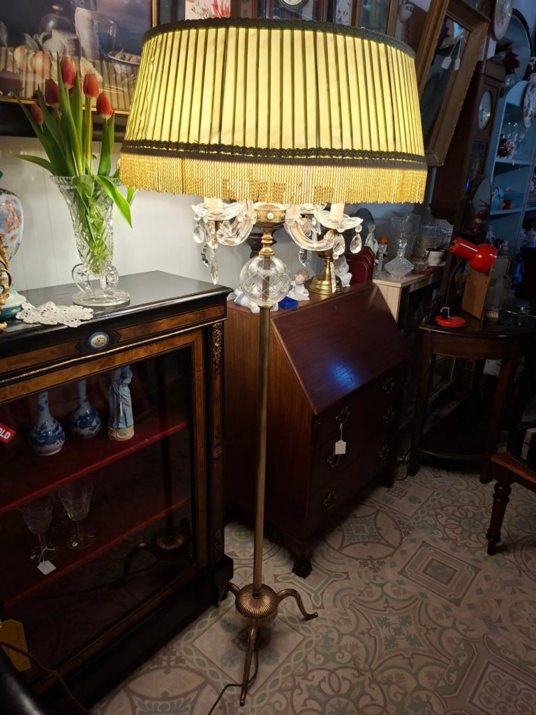 Italian Mid-century Brass and Glass
Floor Lamp. In excellent condition.
Measures 60" high on 17" base. Original shade.